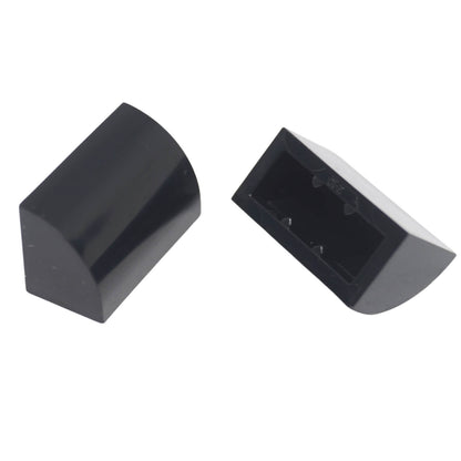 LEGO® Curved 1 x 2 slope with bottom stud holder in black, smooth curved piece for detailed shaping.
