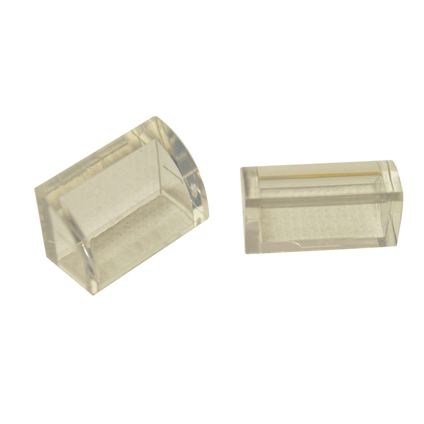 LEGO® Curved 1 x 2 slope with bottom stud holder in trans-clear, smooth curved piece for detailed shaping.
