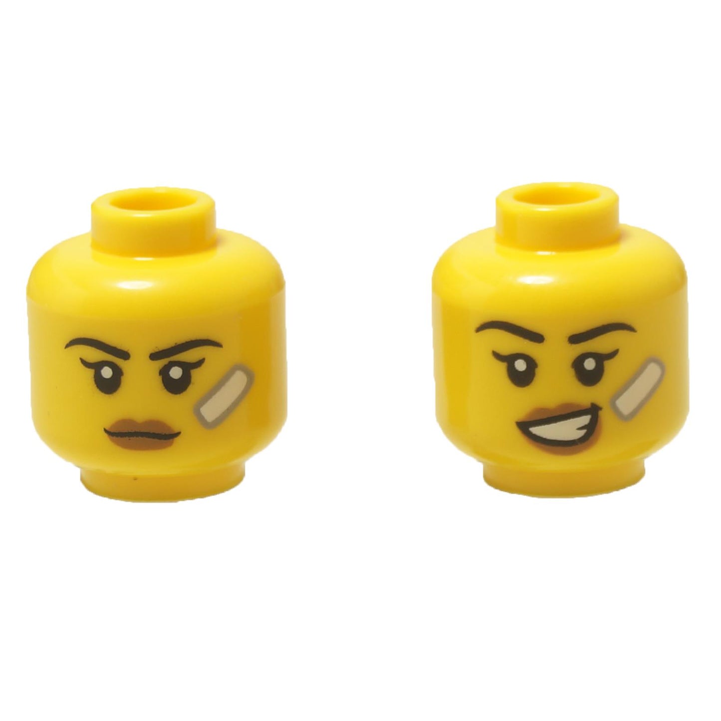 LEGO® dual-sided female head (3626pb3770) with a bandage, showing both the determined and grinning expressions.