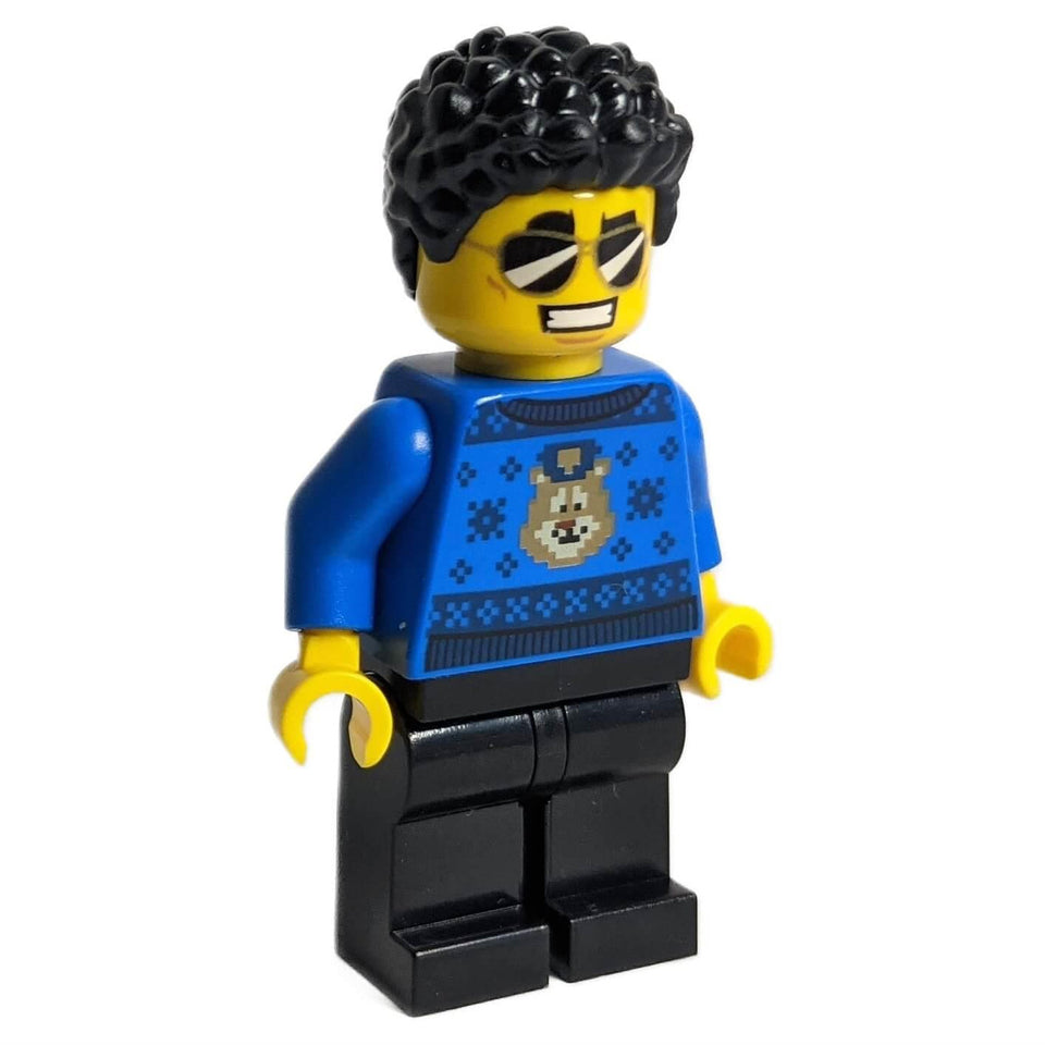 Duke DeTain cty1207 LEGO minifigure in a blue Christmas sweater.