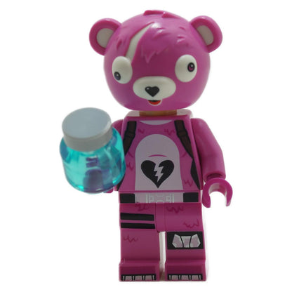 The LEGO Fortnite Cuddle Team Leader minifigure (fort004) in her iconic pink bear costume, holding a Slurp Juice accessory.