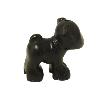LEGO® Friends black puppy figure with curled tail side view