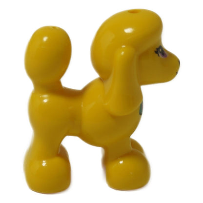 Side view of LEGO® Friends Poodle 11575pb05 in bright light yellow with printed hearts collar and purple eyes from LEGO® Friends pet collection.