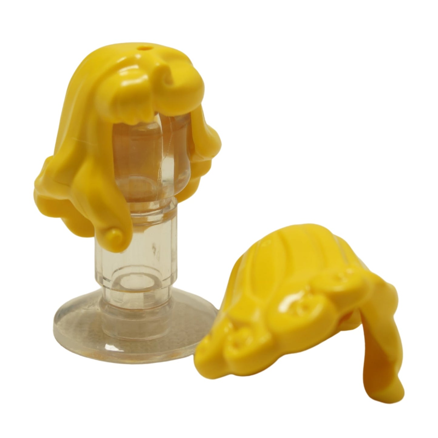 LEGO female hair part 3361 long side swept over right shoulder with accessory hole on top in yellow color.