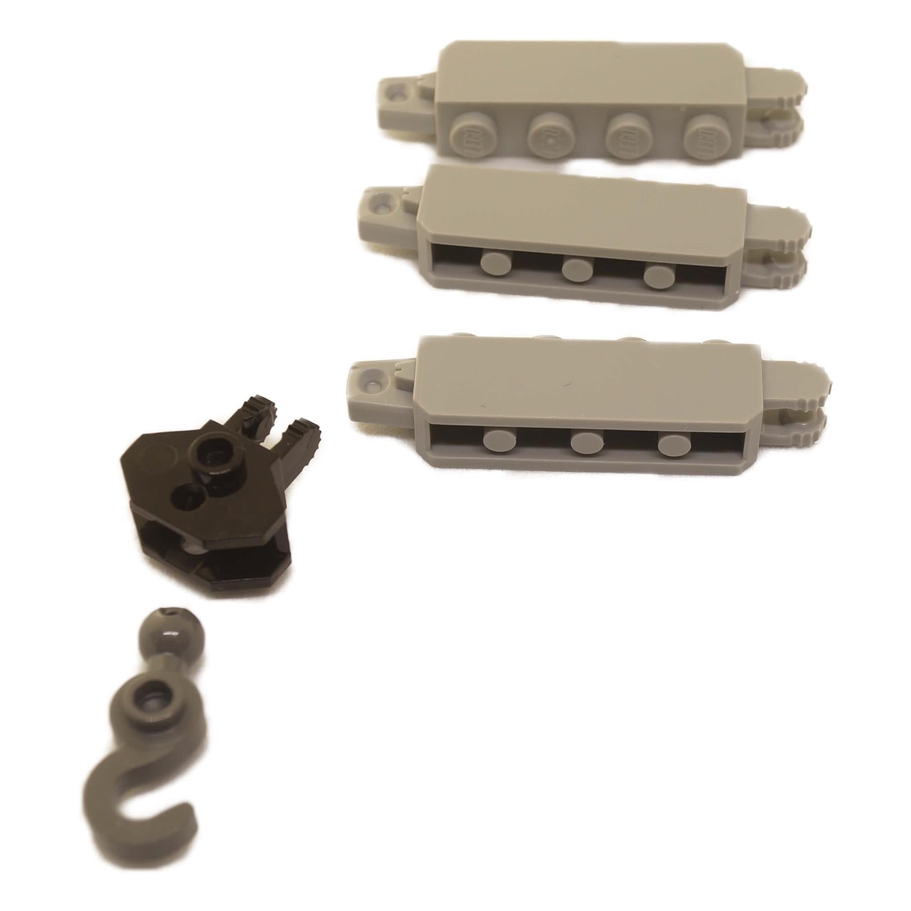 A curated 5-piece lot of genuine LEGO® parts, including three hinge bricks, a towball hook, and a hook with a towball socket, for building articulated joints.