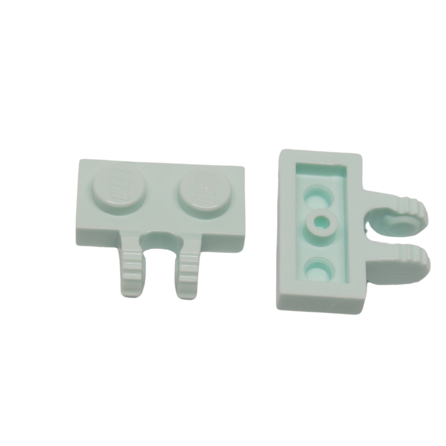 LEGO® Scharnierplatte 1 x 2 mit 2 Fingern an der Seite und 9 Zähnen in helltürkis, verwendet für verstellbare Scharnierabschnitte und artikulierte Bauweisen
