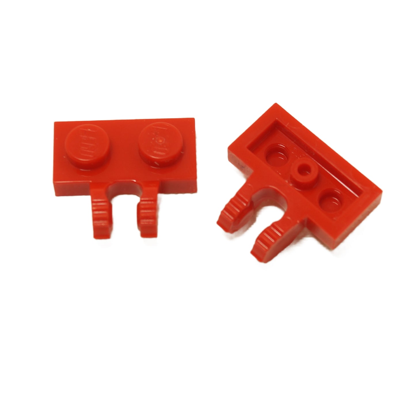 LEGO® Scharnierplatte 1 x 2 mit 2 Fingern an der Seite und 9 Zähnen in rot, verwendet für verstellbare Scharnierabschnitte und artikulierte Bauweisen
