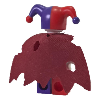 LEGO Nexo Knights Jestro minifigure nex013 with red and purple jester hat and tattered cape. Back profile view.