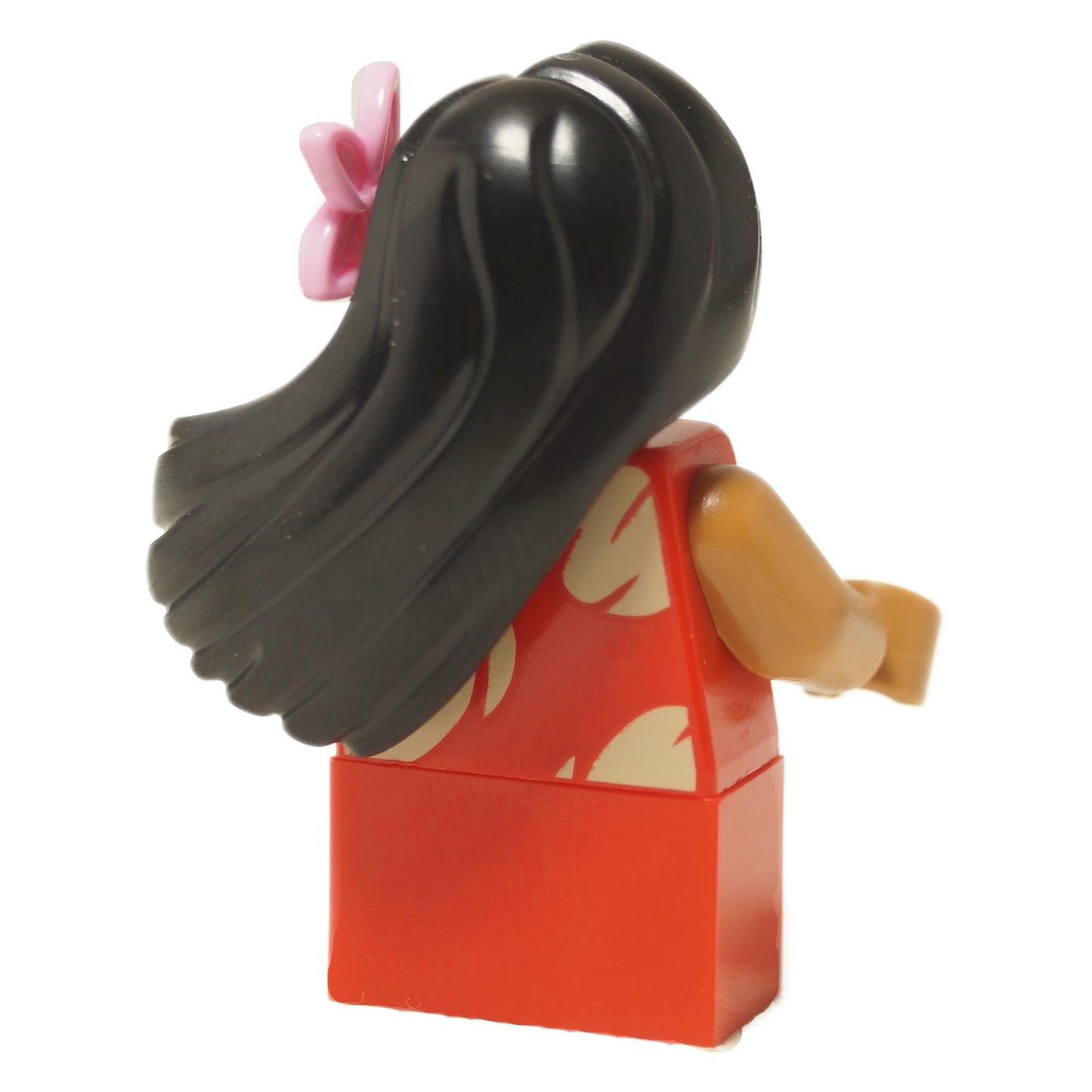Back view of LEGO® Lilo minifigure showing long dark hair with pink flower and red leaf-patterned dress.