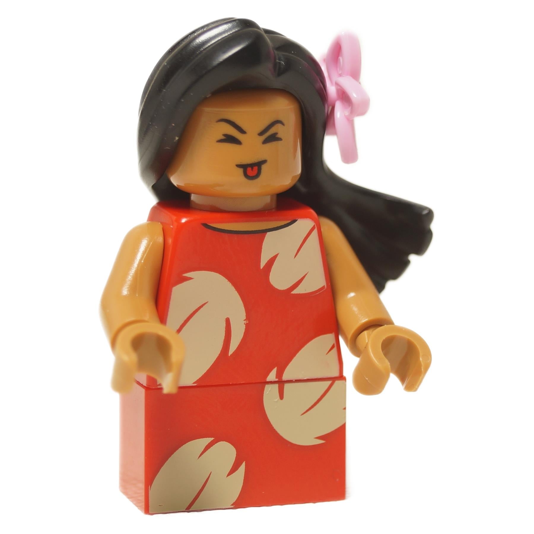 LEGO® Lilo minifigure with red leaf-print dress, dark hair, and pink flower accessory, smiling with tongue out.