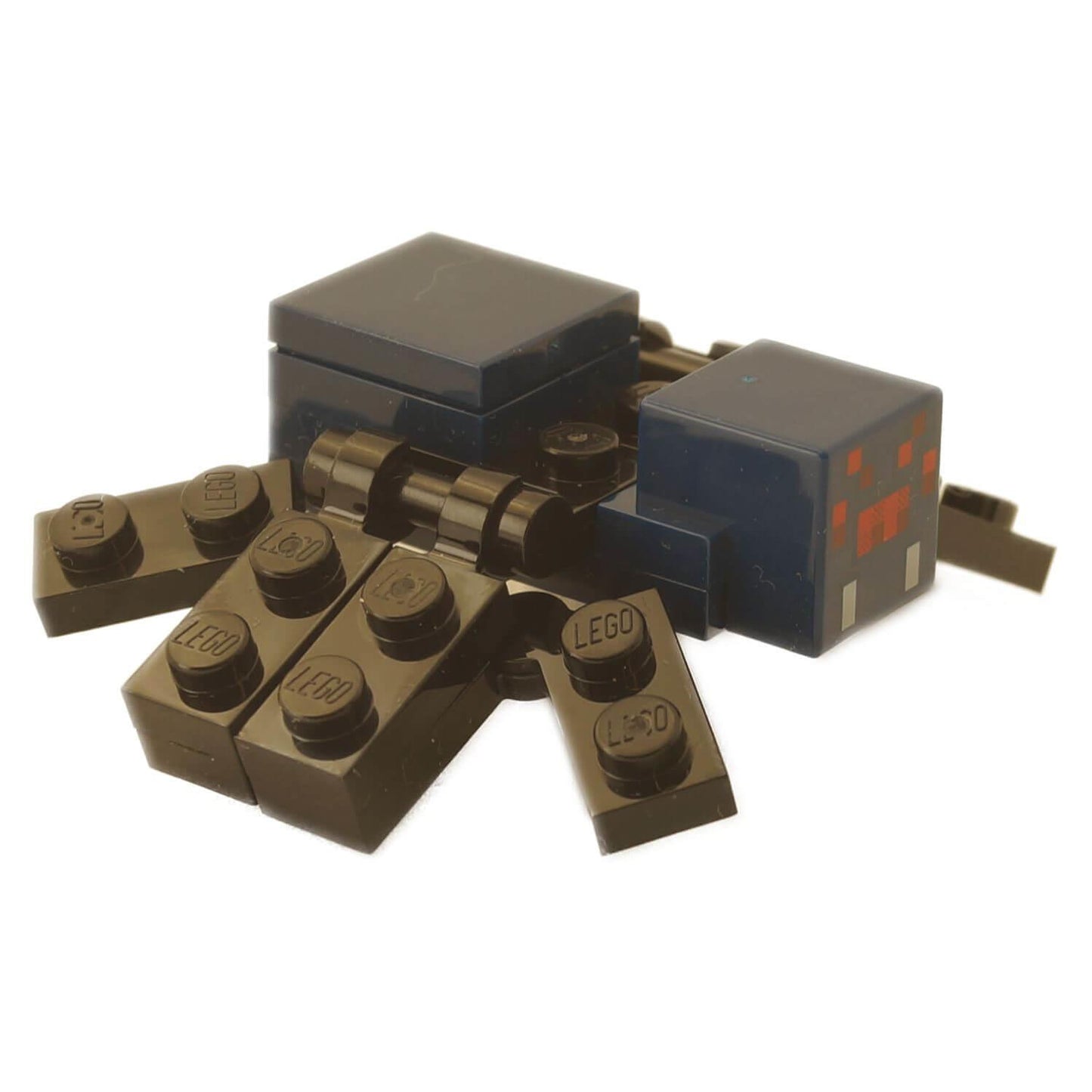 砖砌的 LEGO Cave Spider 的侧面轮廓，展示了深蓝色的身体段和腿部连接夹。