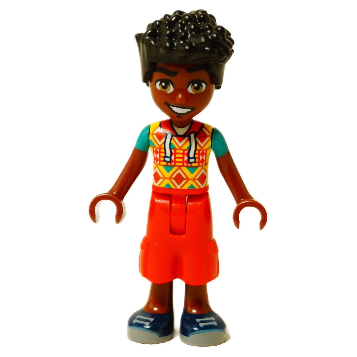 LEGO® mini-doll Zac wearing a geometric patterned shirt and red shorts, Friends-style figure with curly hair
