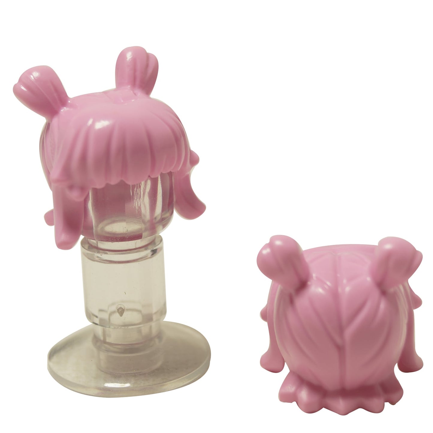 LEGO® female minifigure hair with space buns and thick straight bangs, modern playful hairstyle for characters, bright pink color
