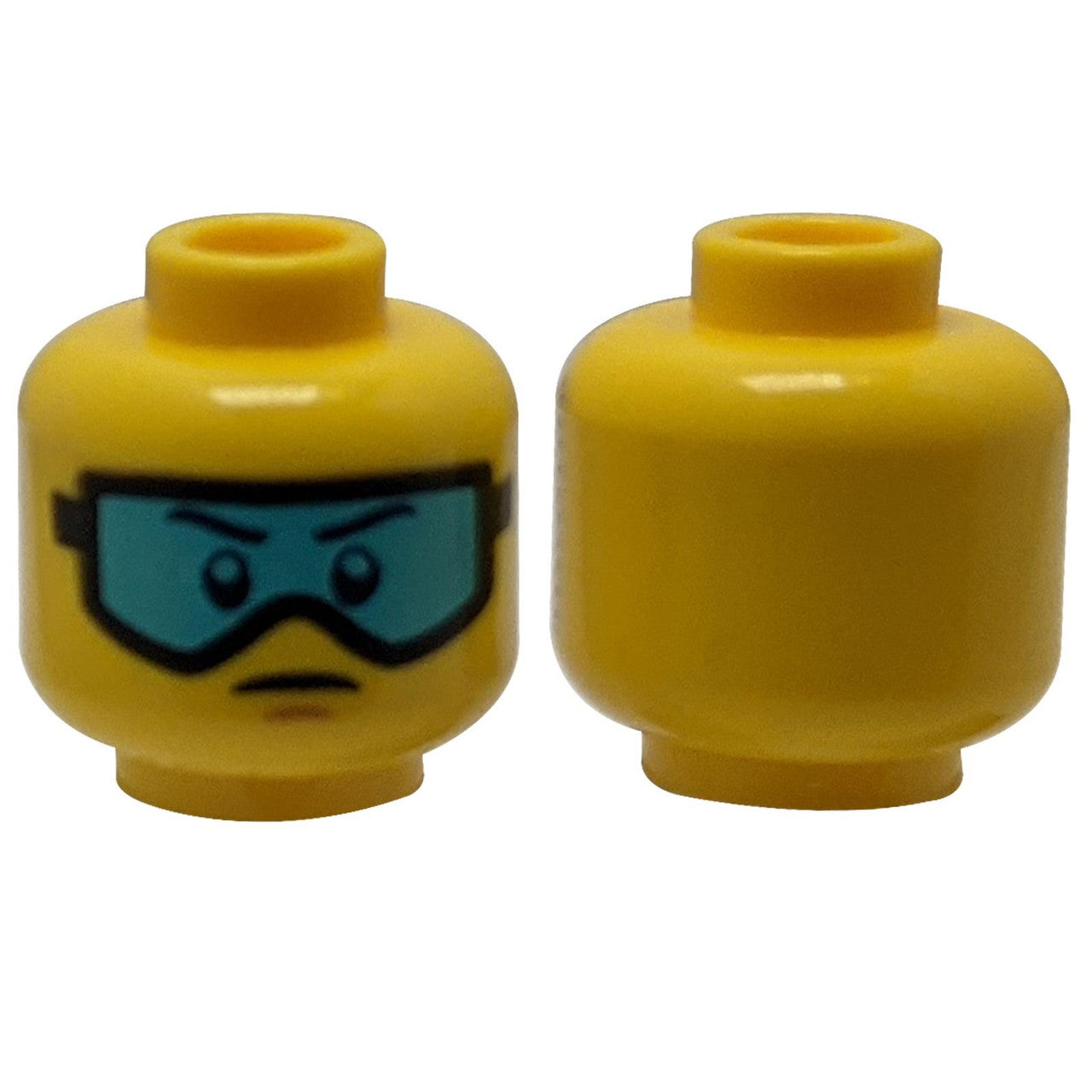 LEGO® Minifigure Head (3626pb0561) with a slight frown and printed light blue ski goggles over glasses.
