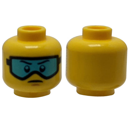 LEGO® Minifigure Head (3626pb0561) with a slight frown and printed light blue ski goggles over glasses.
