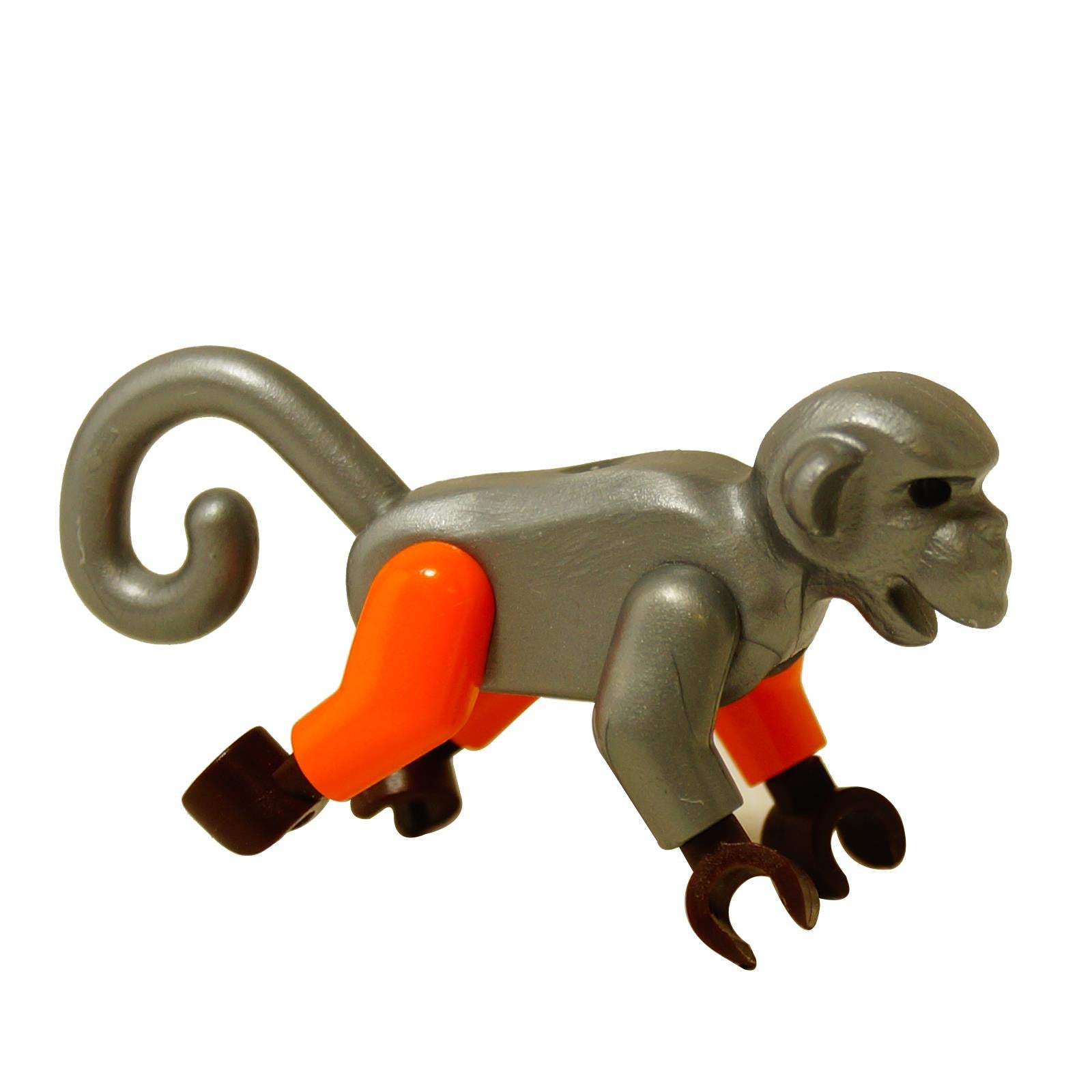 LEGO® Ninjago monkey figure named Wretch in silver with orange legs, brown hands and feet, and curled tail.