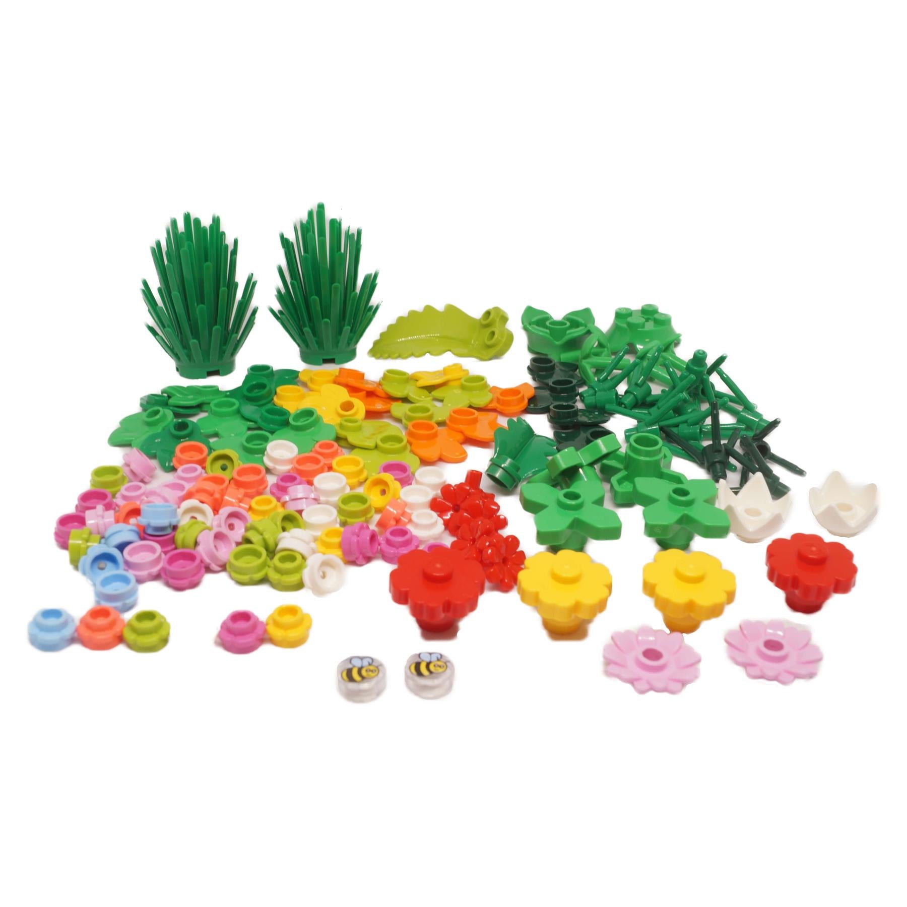 120 assorted LEGO plant and flower pieces including grass clumps, flower heads, leaf plates, and printed bee tiles in multiple colours