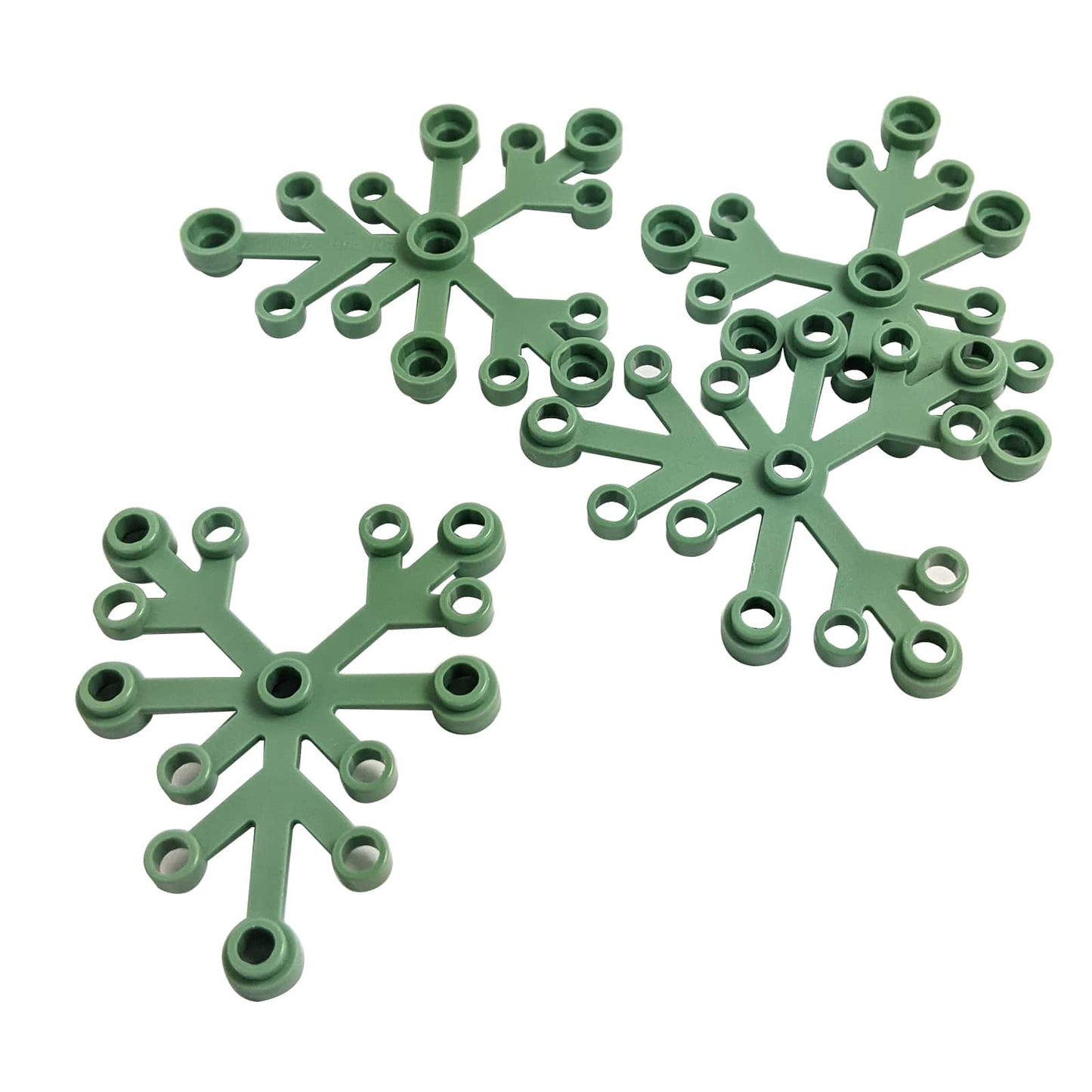 LEGO® Plant Leaves 6 x 5 in sand green, featuring six curved leaf segments connected at a central hub.
