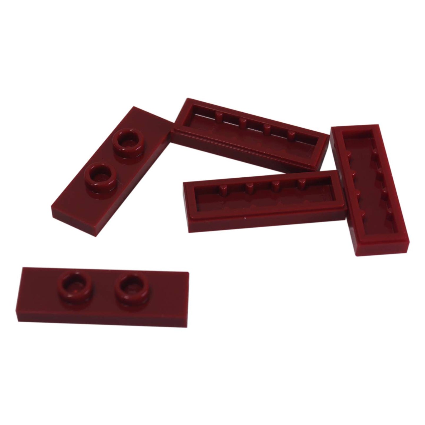 LEGO® Modified Plate 1 x 3 with 2 studs (double jumper) in dark red, useful for offset building connections.
