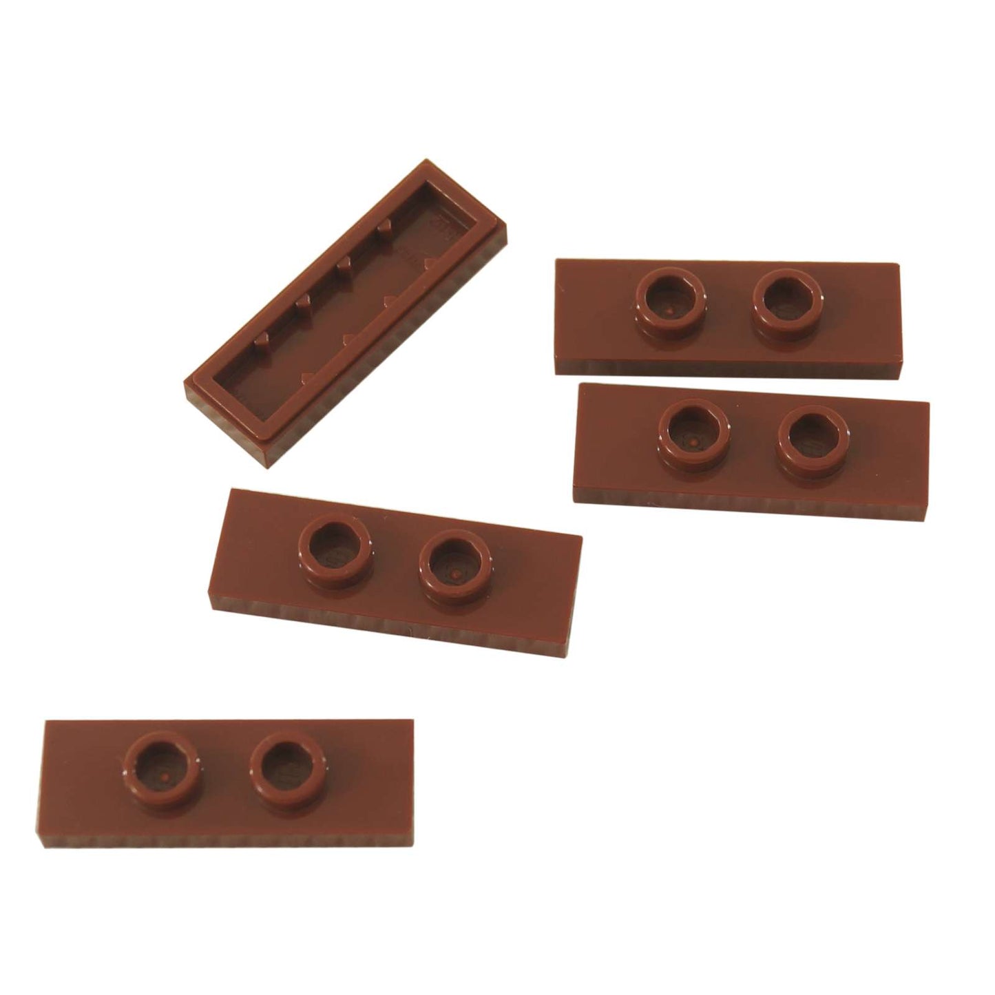 LEGO® Modified Plate 1 x 3 with 2 studs (double jumper) in reddish brown, useful for offset building connections.
