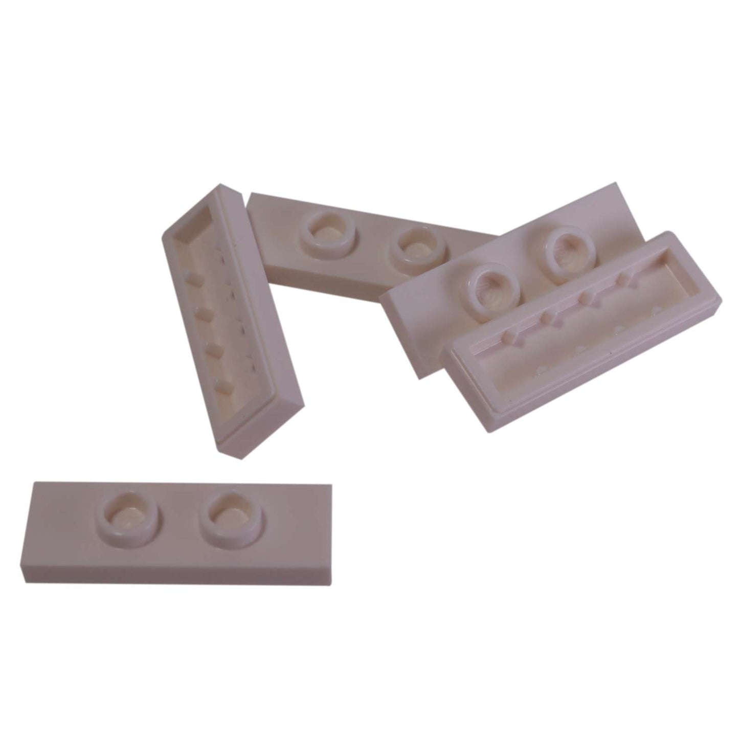 LEGO® Modified Plate 1 x 3 with 2 studs (double jumper) in white, useful for offset building connections.
