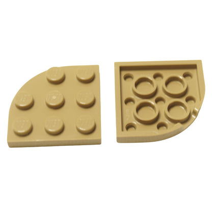 Dark tan LEGO® round corner plate 3×3, a curved 90-degree connector piece used for shaping bases and smooth structural edges.
