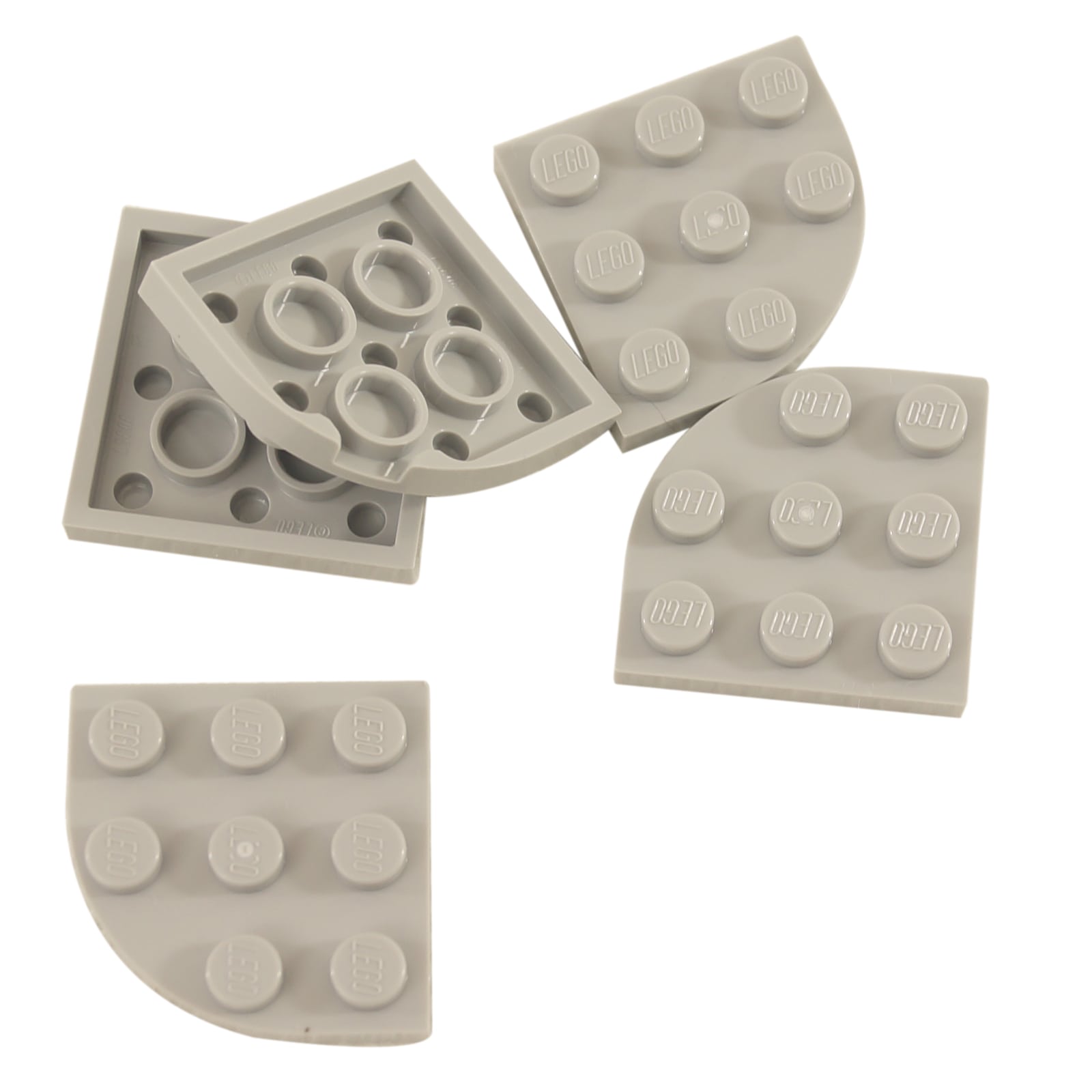 Light gray LEGO® round corner plate 3×3, a curved 90-degree connector piece used for shaping bases and smooth structural edges.
