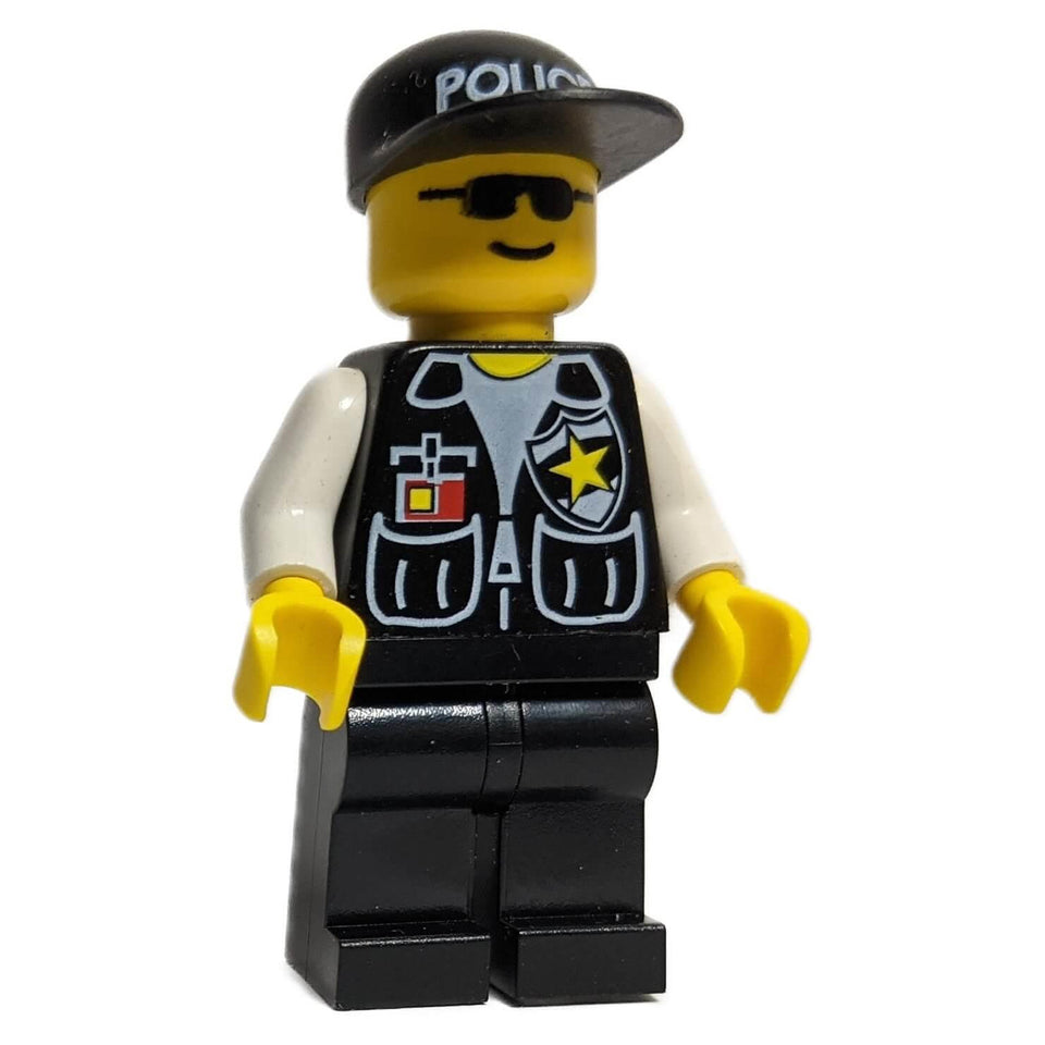 LEGO cop044 Police minifigure with cap and sunglasses.