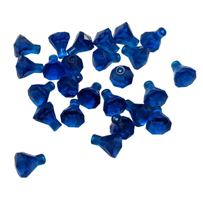 Pieza de joya Rock 1×1 de color azul oscuro transparente LEGO® con diseño de corte de 24 facetas, utilizada para gemas, cristales y elementos decorativos en construcciones.
