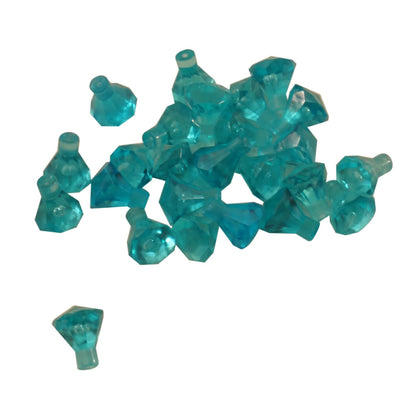 Pieza de joya Rock 1×1 de color azul claro transparente LEGO® con diseño de corte de 24 facetas, utilizada para gemas, cristales y elementos decorativos en construcciones.
