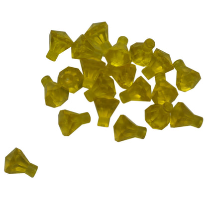 Pieza de joya Rock 1×1 de color amarillo transparente LEGO® con diseño de corte de 24 facetas, utilizada para gemas, cristales y elementos decorativos en construcciones.
