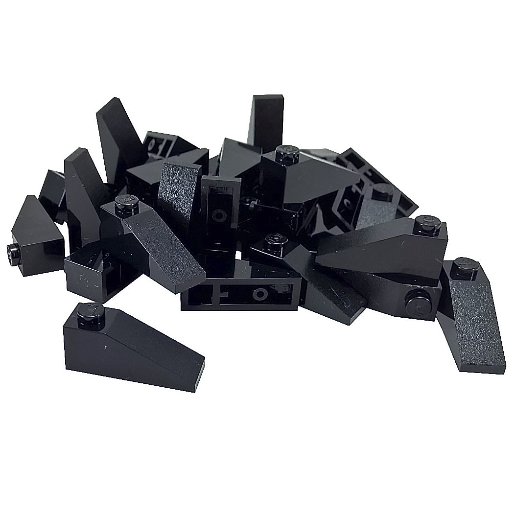 LEGO® Slope 33 3 x 1 in black, a narrow angled slope piece used for rooflines and smooth transitions.
