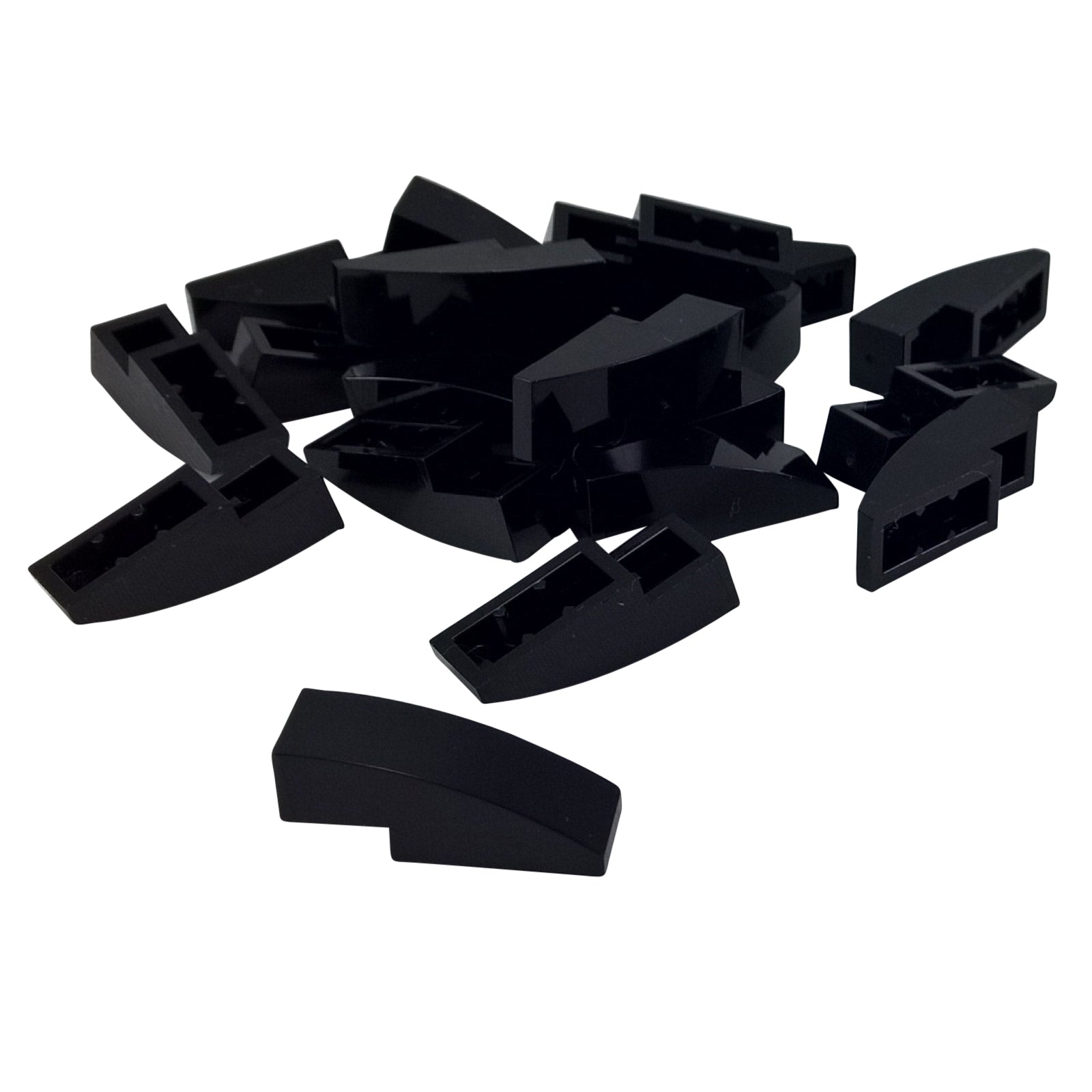 Close-up of LEGO® Slope, Curved 3 x 1 (50950) in black, featuring a smooth curved design ideal for vehicle bodies, architecture, and decorative detailing.