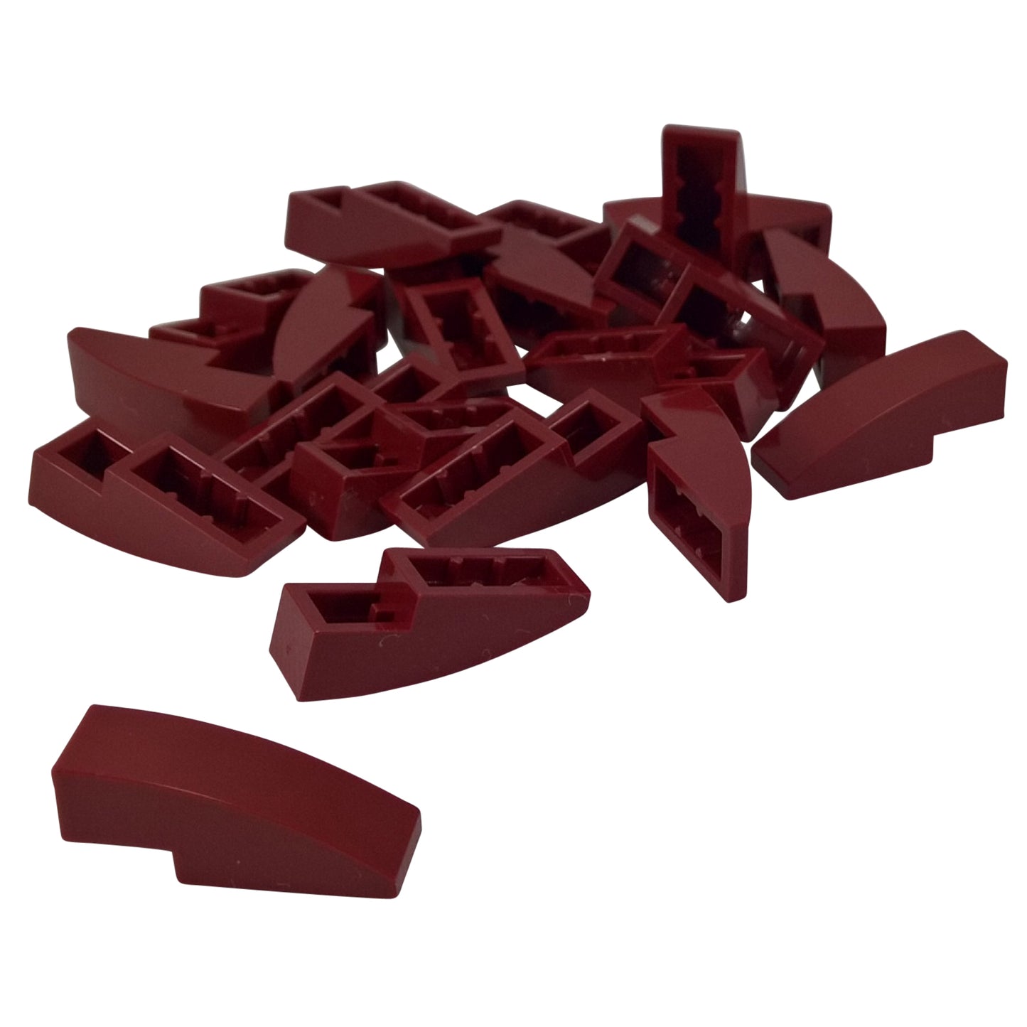 Close-up of LEGO® Slope, Curved 3 x 1 (50950) in dark red, featuring a smooth curved design ideal for vehicle bodies, architecture, and decorative detailing.
