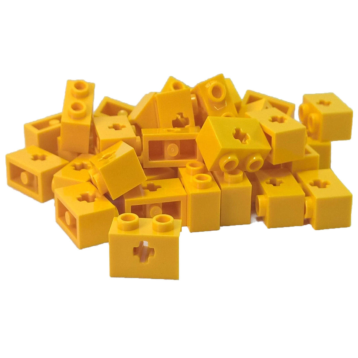 Yellow LEGO Technic 32064 brick 1 x 2 with axle hole