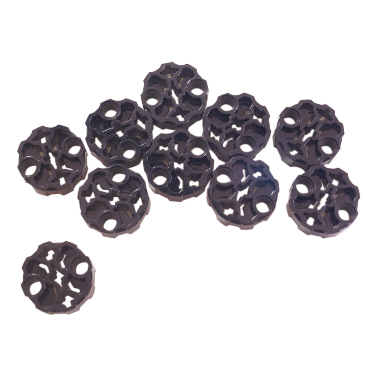 Black LEGO Technic 98585 round axle connector block with 2 pin holes and 3 axle holes