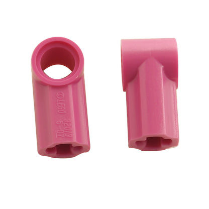 LEGO® Technic Axle and Pin Connector Angled #1 in dark pink, used for angled Technic connections and structural builds

