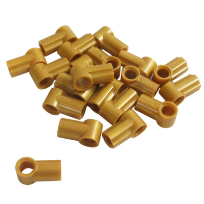 LEGO® Technic Axle and Pin Connector Angled #1 in pearl gold, used for angled Technic connections and decorative structural builds
