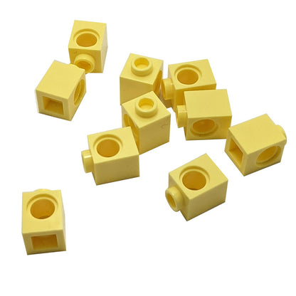 LEGO® Technic brick 1 x 1 with round hole for axle or pin connections, bright light yellow color
