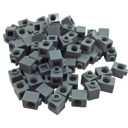 LEGO® Technic brick 1 x 1 with round hole for axle or pin connections, dark bluish gray color
