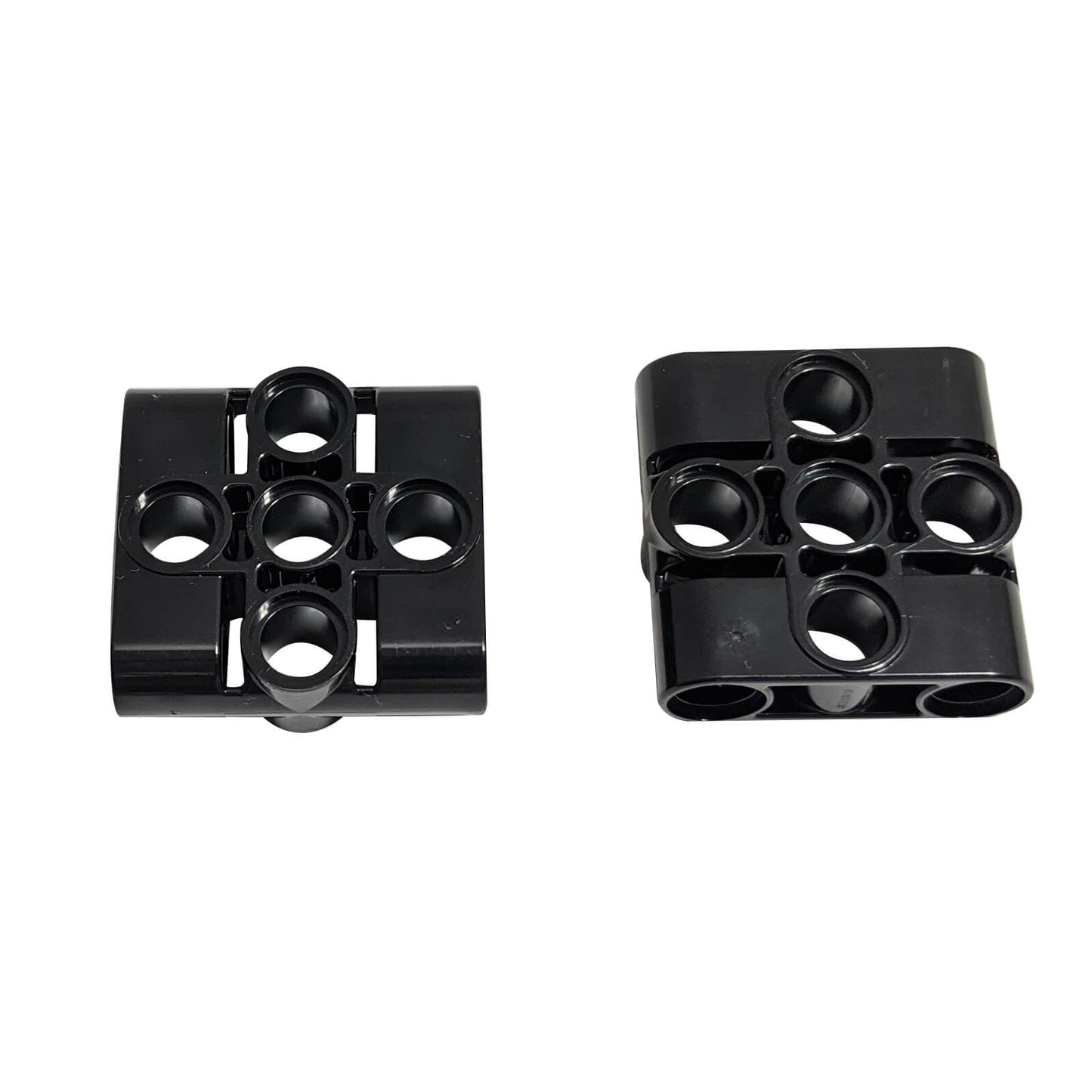 LEGO® Technic Pin Connector Block 3 x 3 with 4 Pins (39793) in black, shown side by side on white background