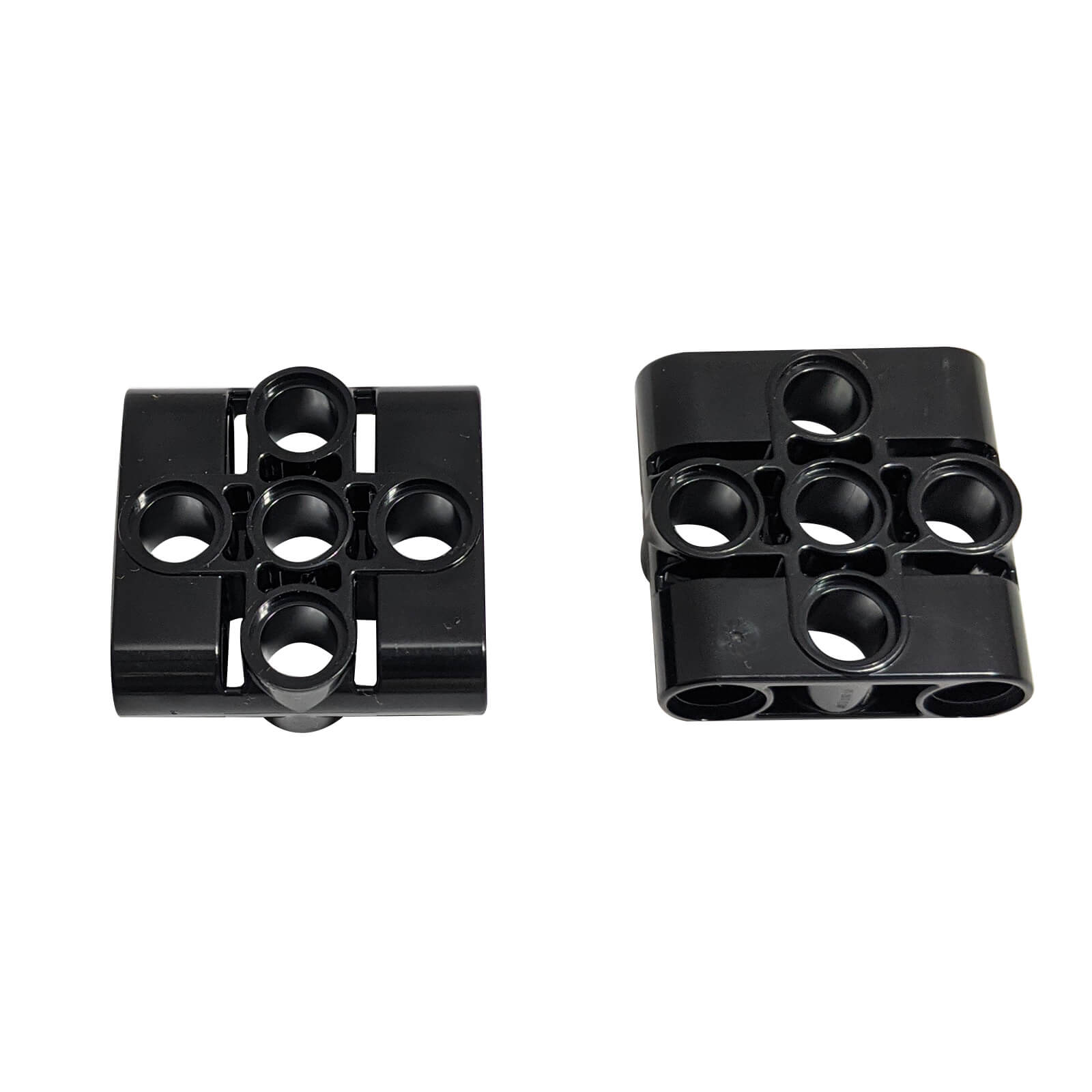 LEGO® Technic Pin Connector Block 3 x 3 with 4 Pins (39793) in black, shown side by side on white background