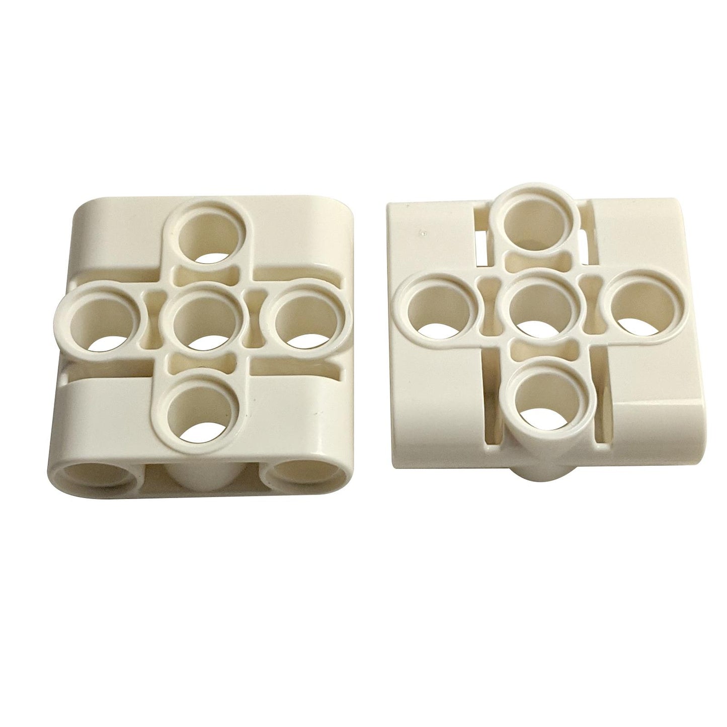 LEGO® Technic Pin Connector Block 3 x 3 with 4 Pins (39793) in white, shown side by side on white background
