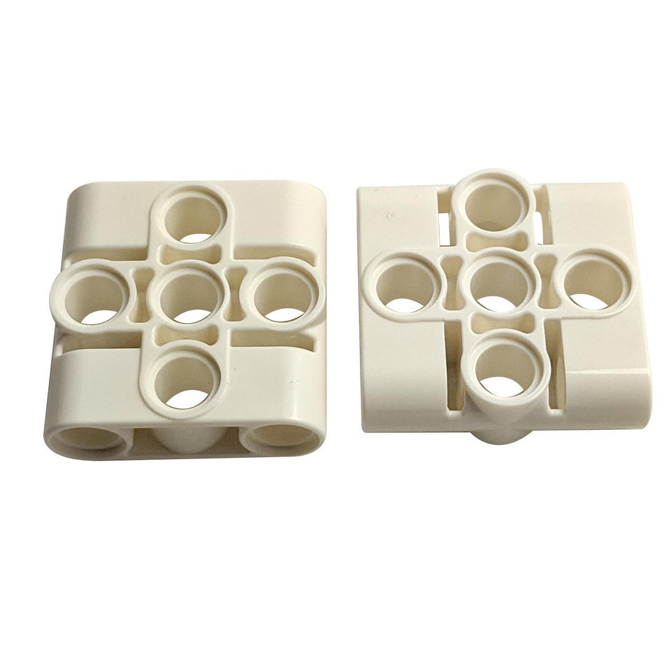 LEGO® Technic Pin Connector Block 3 x 3 with 4 Pins (39793) in white, shown side by side on white background