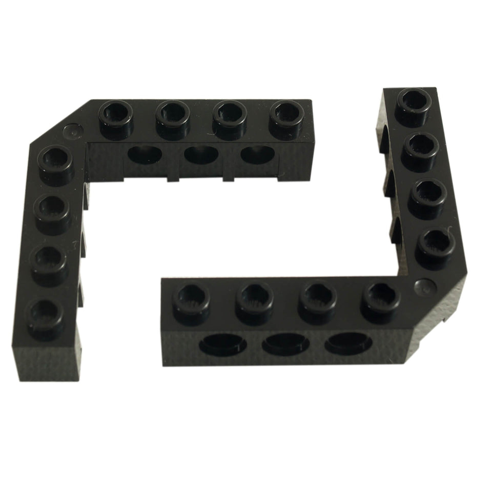 Two black LEGO Technic 5 x 5 right angle bricks, part 32555, showing studs and side pin holes