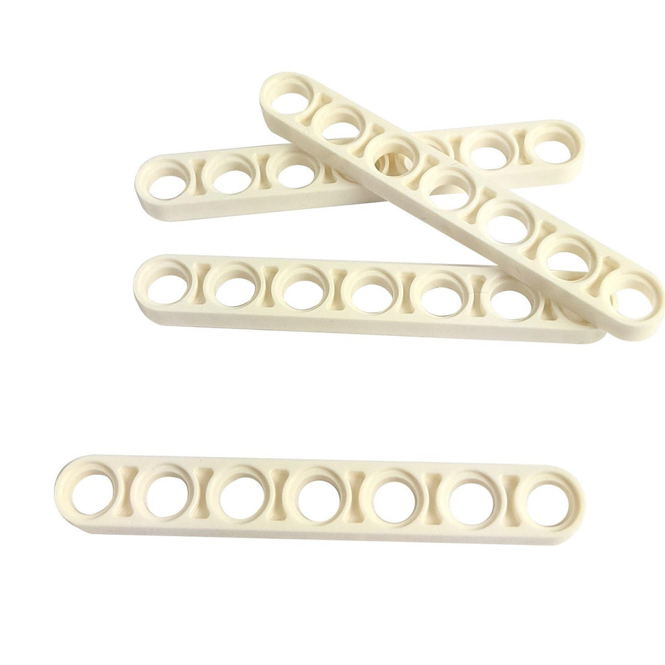 Four white LEGO Technic Thin Liftarm 1 x 7 pieces (Part 32065), laid parallel, showing their slender profile and seven pin-holes for versatile structural connections.