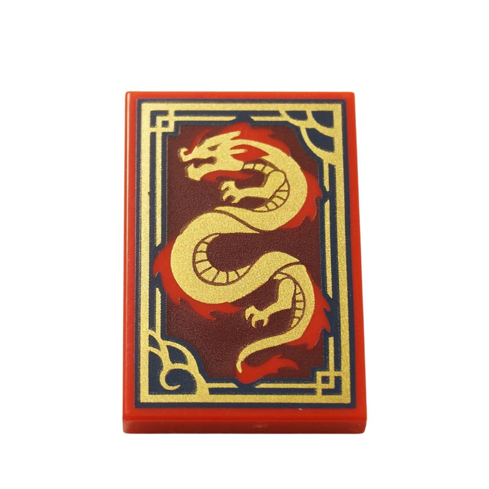 LEGO printed tile 26603pb472 red 2x3 with gold dragon on dark red background and ornate border.