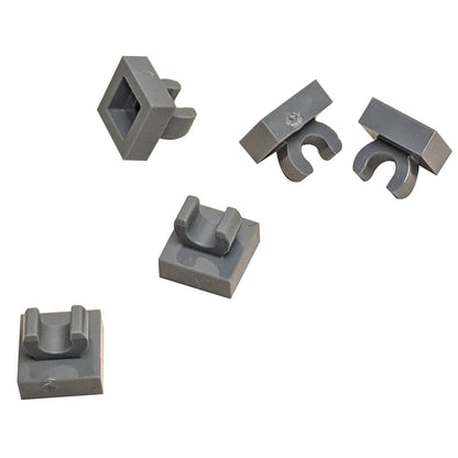 LEGO® Tile Modified 1 x 1 with open O clip (15712) in dark bluish gray, a small connector tile with a circular side clip.
