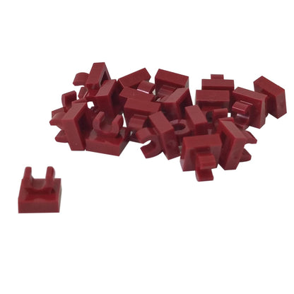 LEGO® Tile Modified 1 x 1 with open O clip (15712) in dark red, a small connector tile with a circular side clip.

