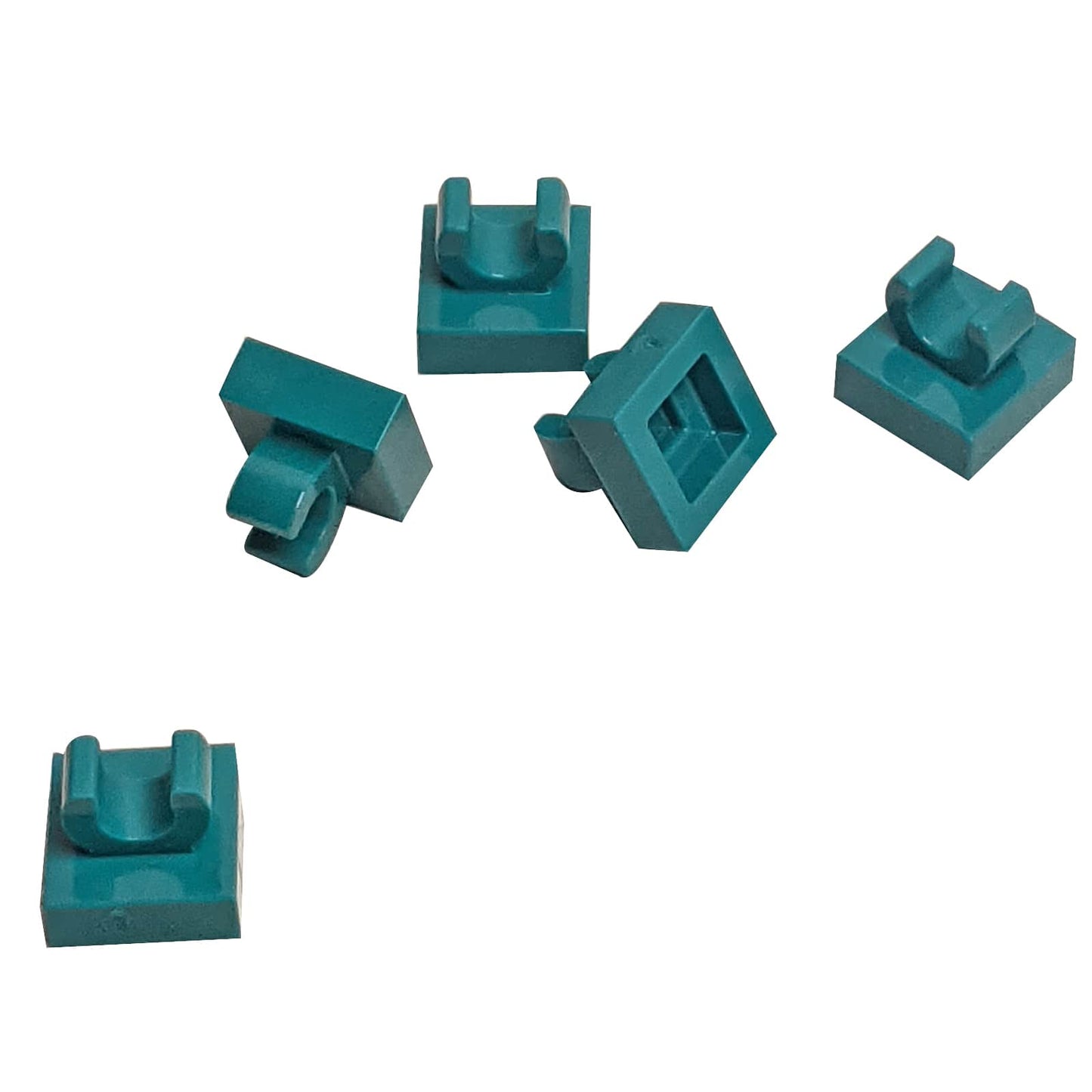 LEGO® Tile Modified 1 x 1 with open O clip (15712) in dark turquiose, a small connector tile with a circular side clip.
